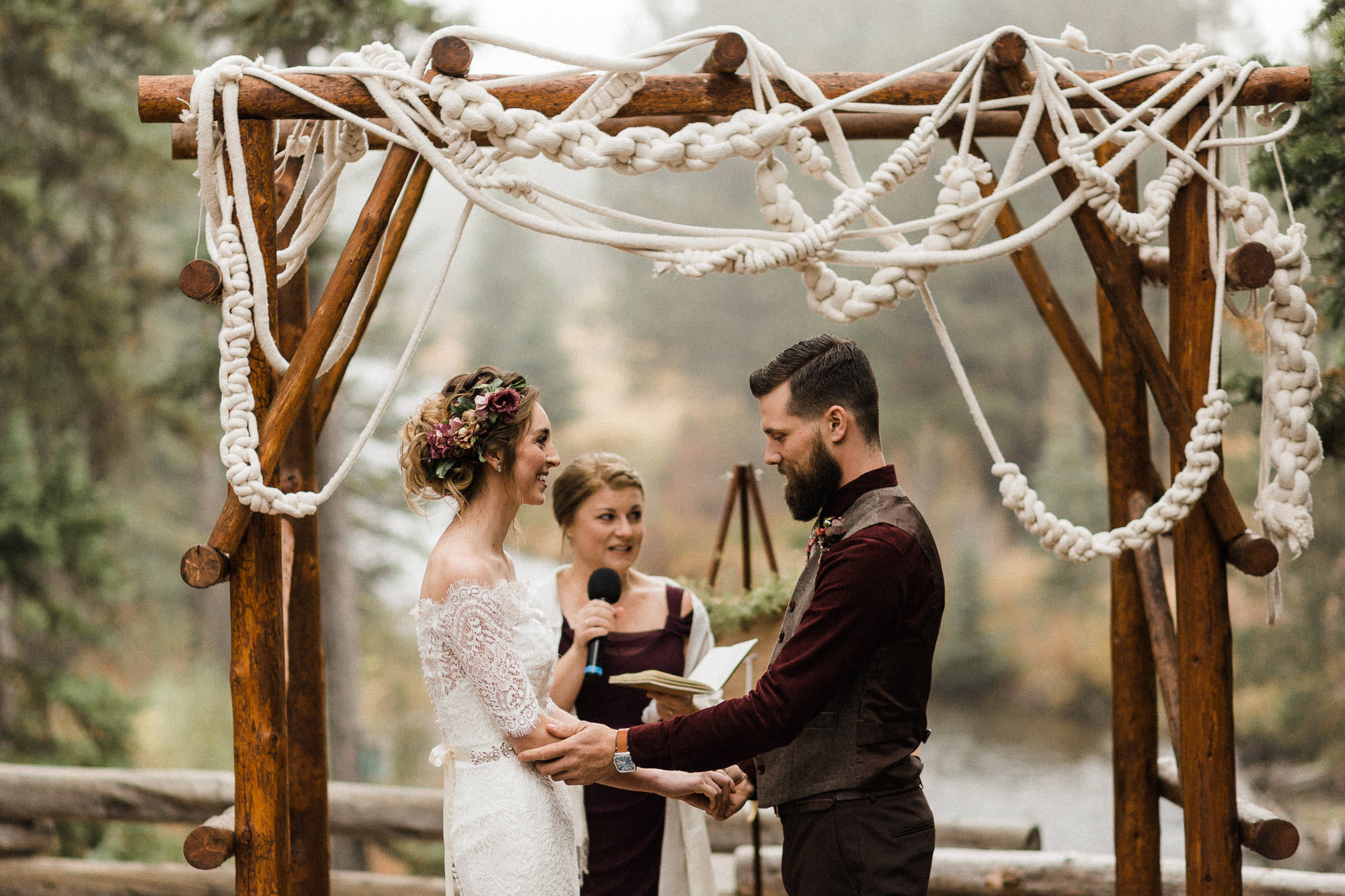 Bride and groom smile during wedding at Skyliner Lodge in Bend, Oregon