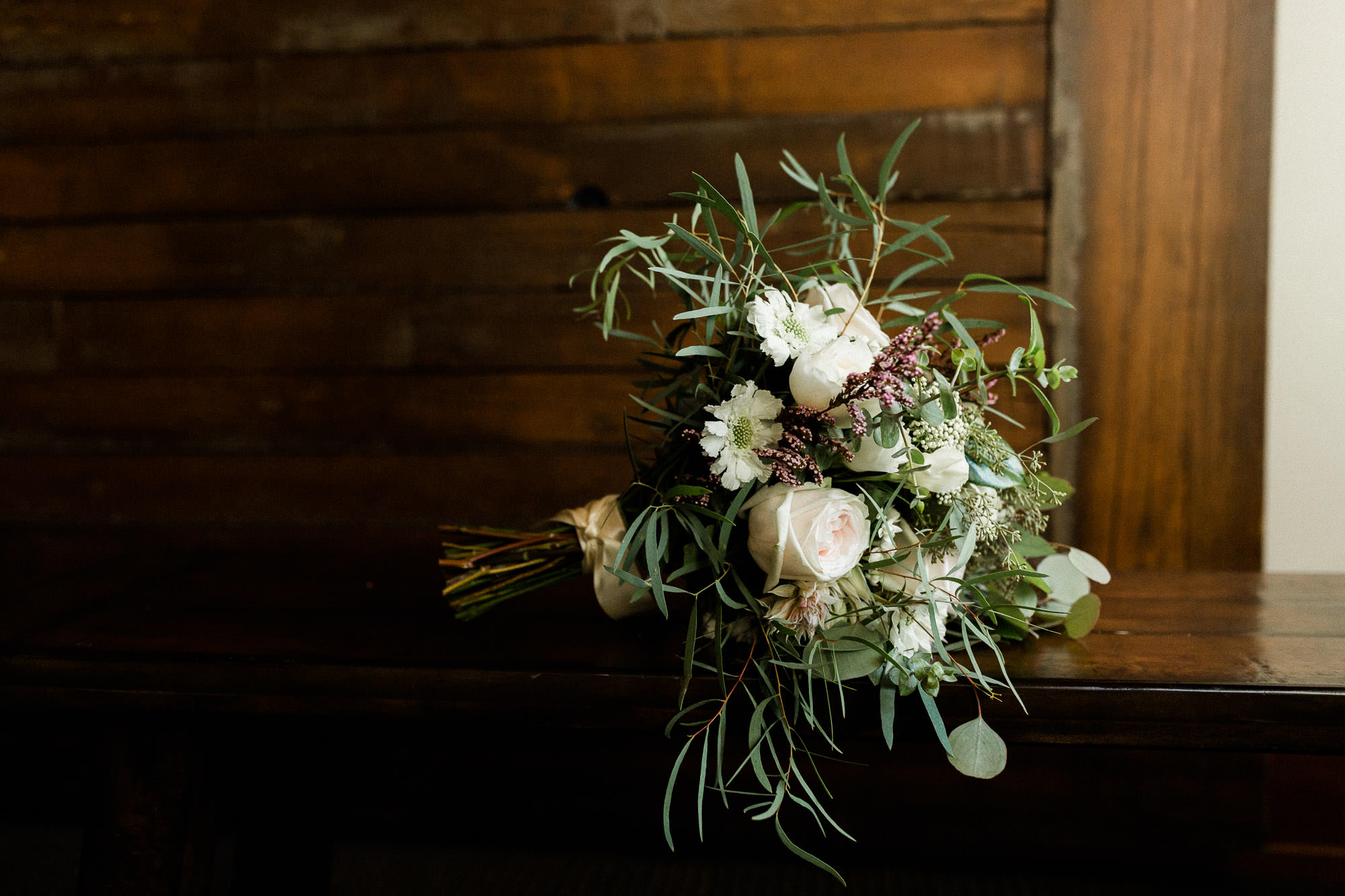 Bride's bouquet sits on a table at Black Butte Ranch