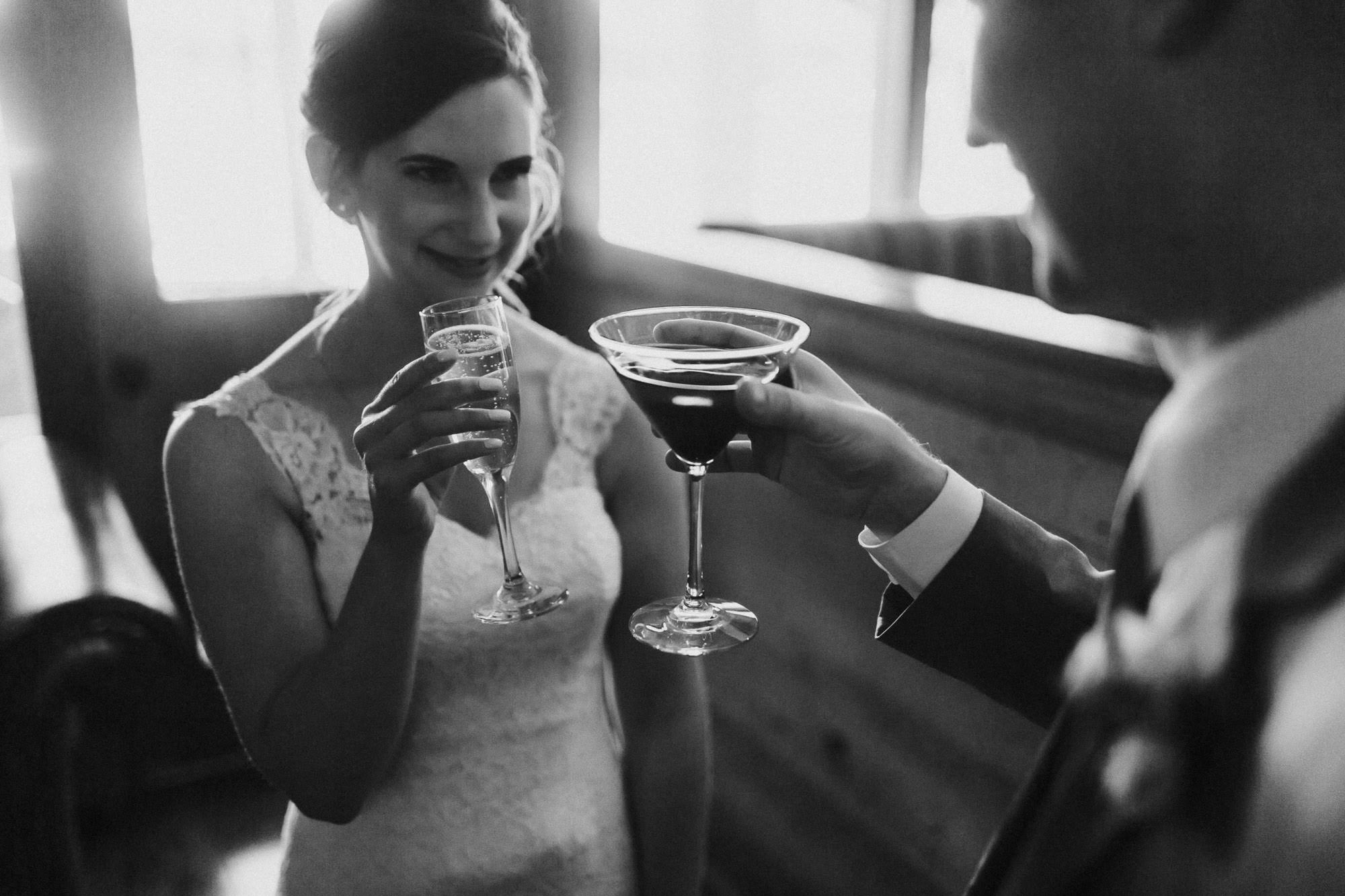 Bride and groom share a "cheers" after their ceremony at Black Butte Ranch
