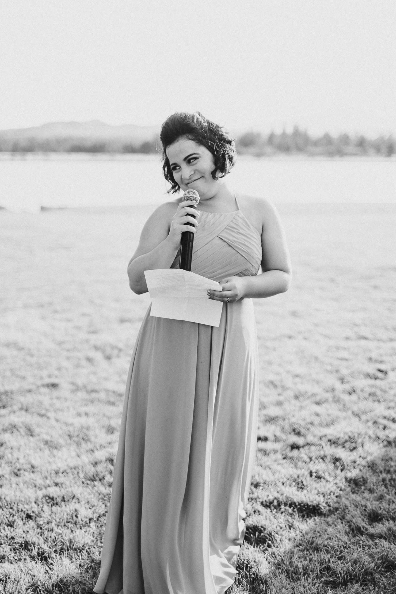 Bridesmaid gives a toast at a wedding reception at Black Butte Ranch