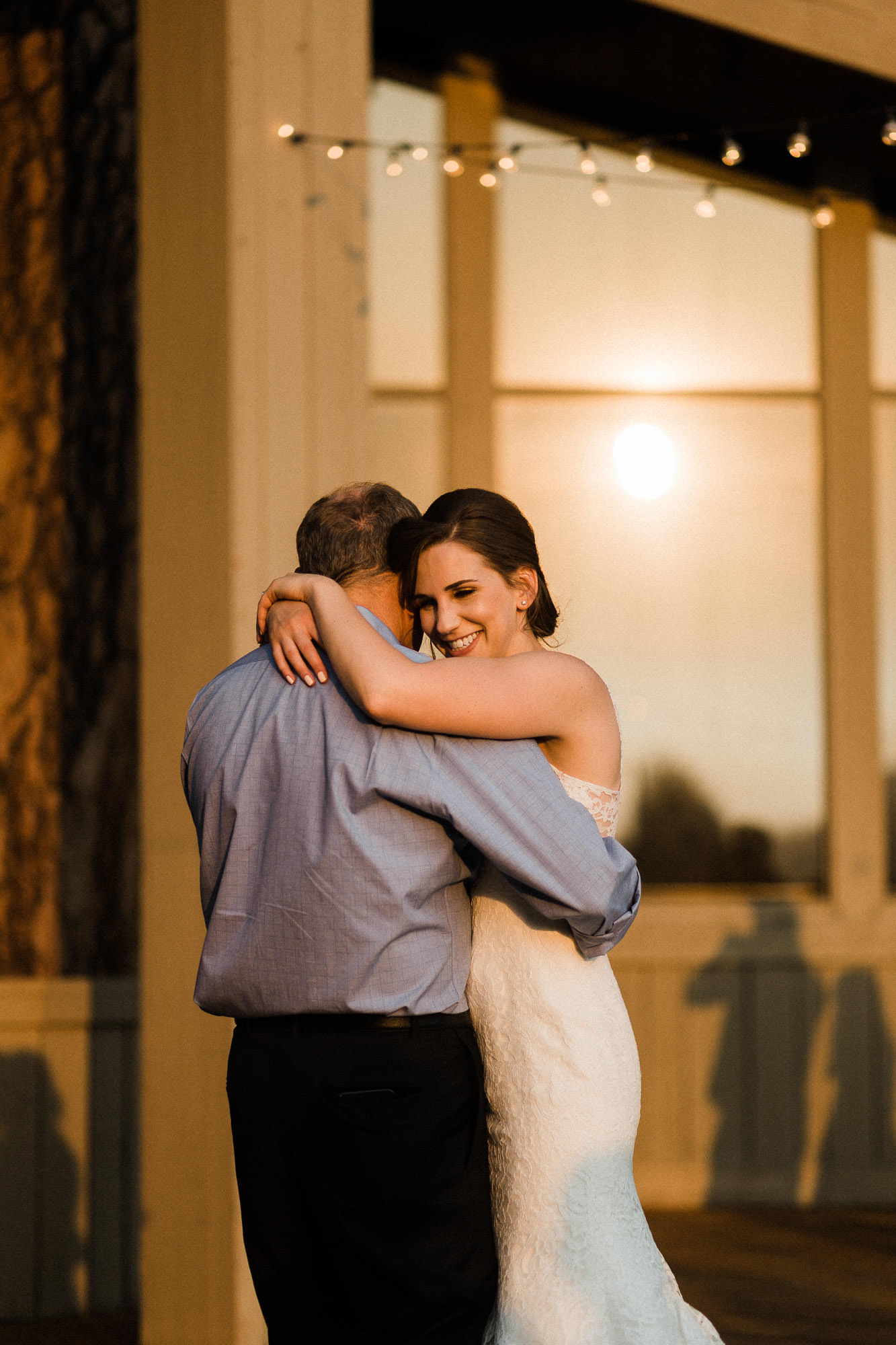 Bride and father dance during wedding reception at Black Butte Ranch