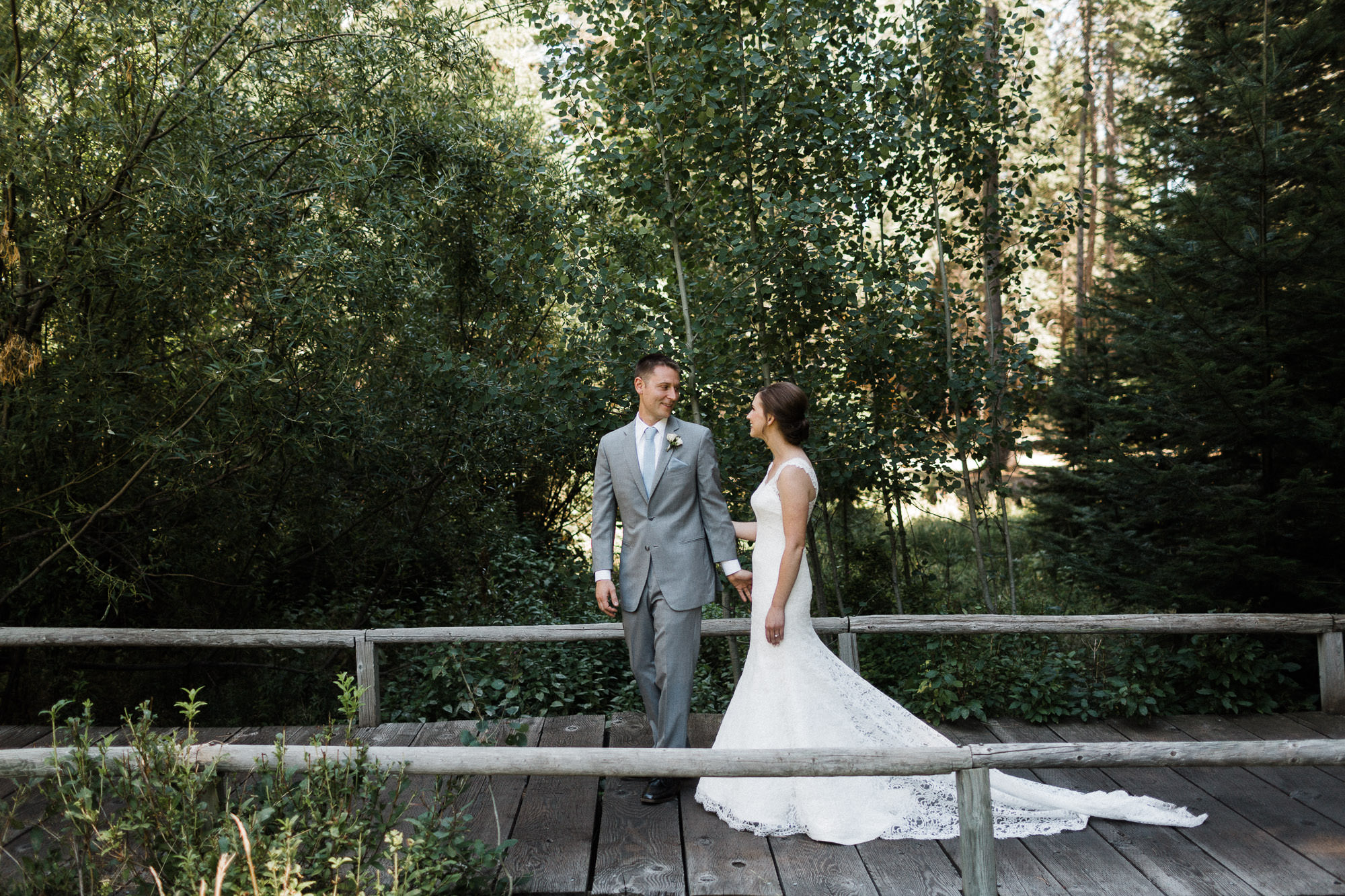 Groom turns to see his bride for the first time on their wedding day at Black Butte Ranch