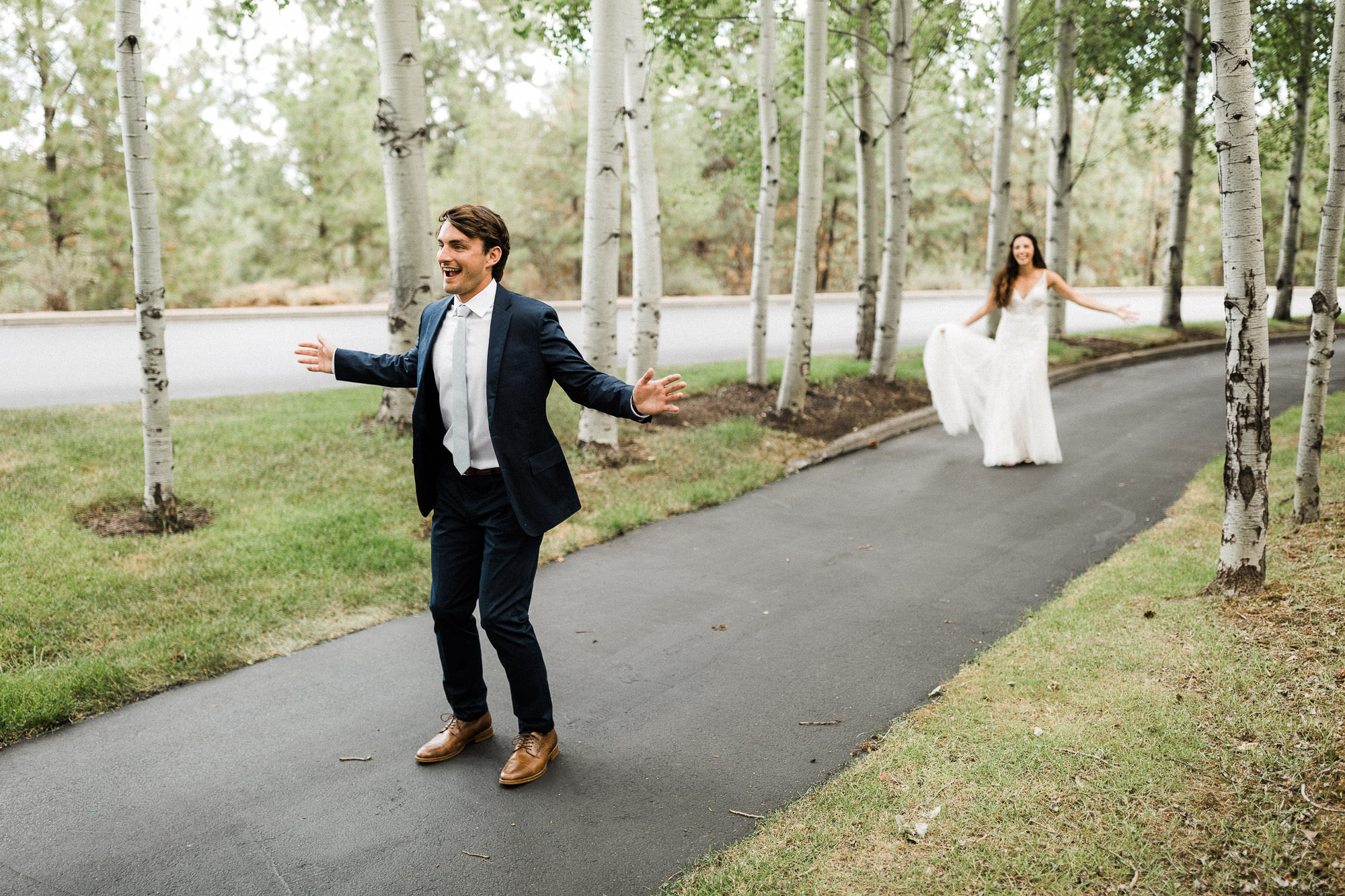 Groom excitedly waits to turn around and see bride for first time Bend, Oregon