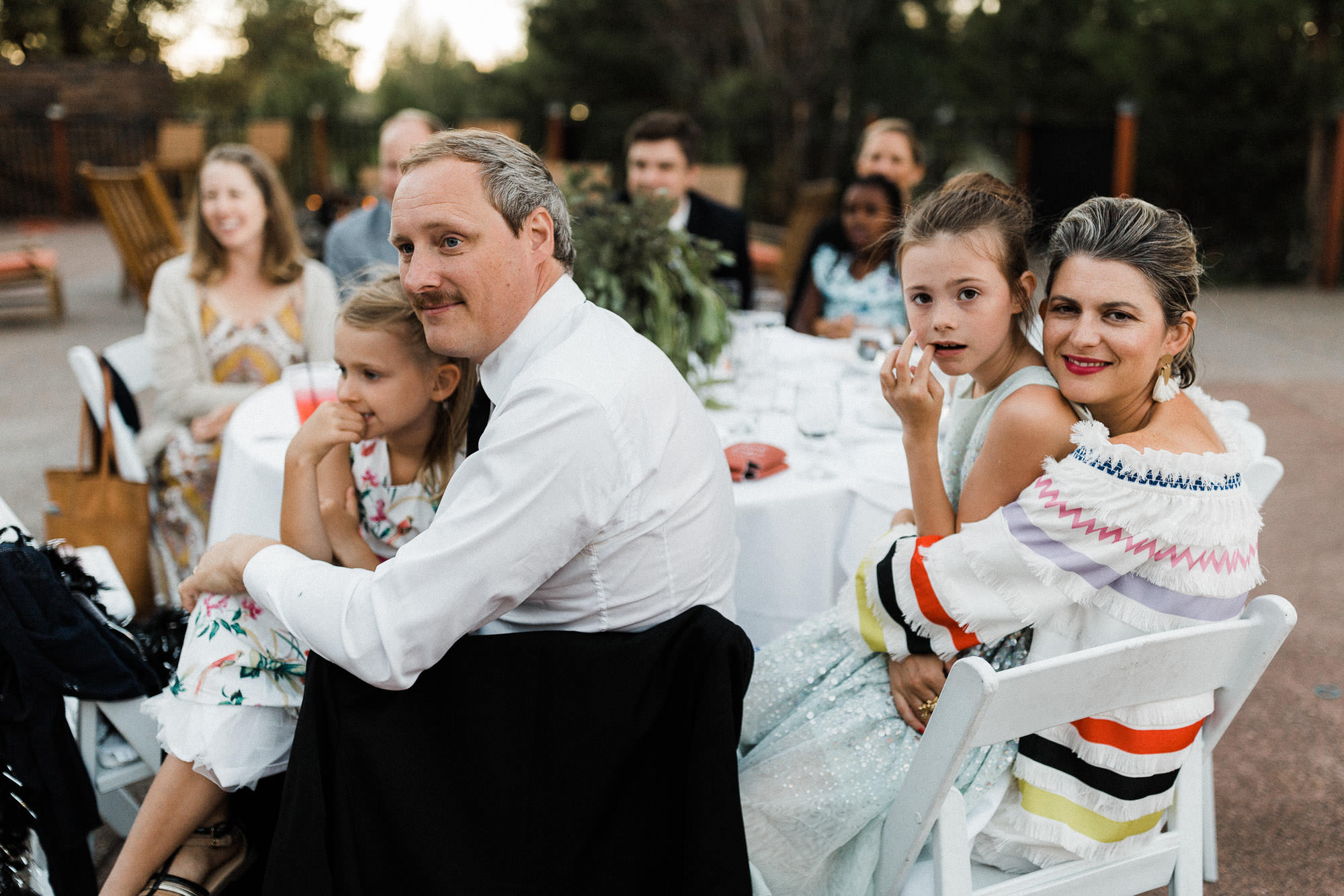 Guests listen to toasts at Broken Top Club wedding in Bend, Oregon