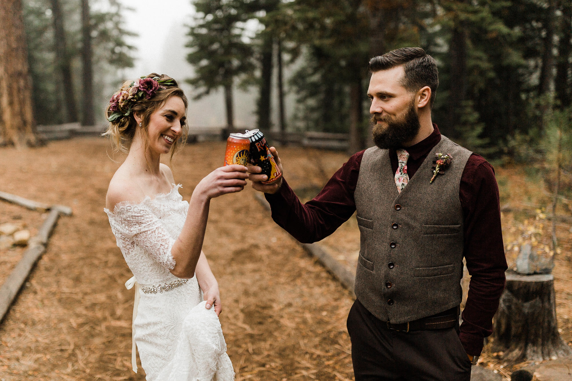Bride and groom "cheers" with cans of beer in Bend, Oregon