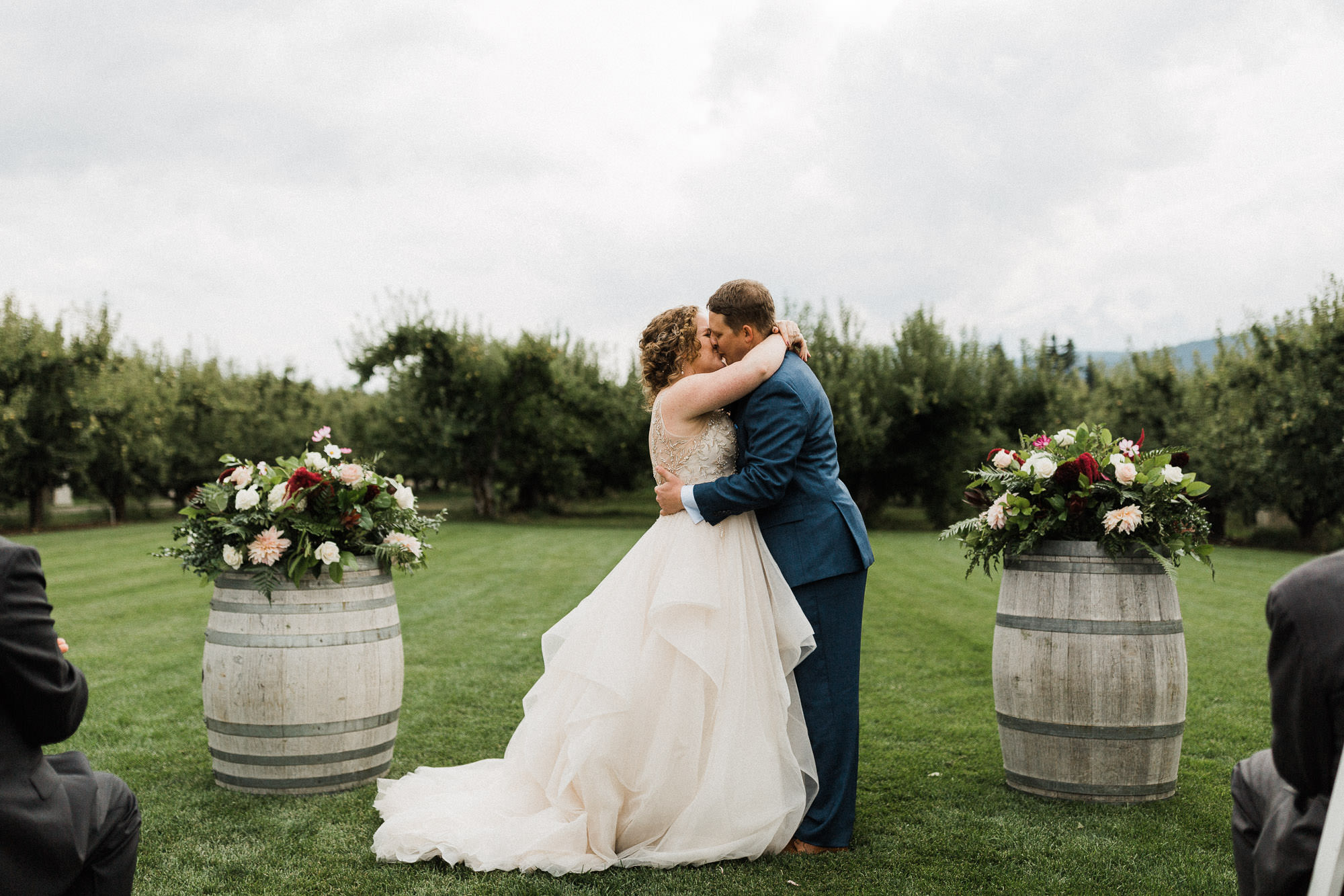 The bride and groom share their first kiss at Mt. View Orchards.