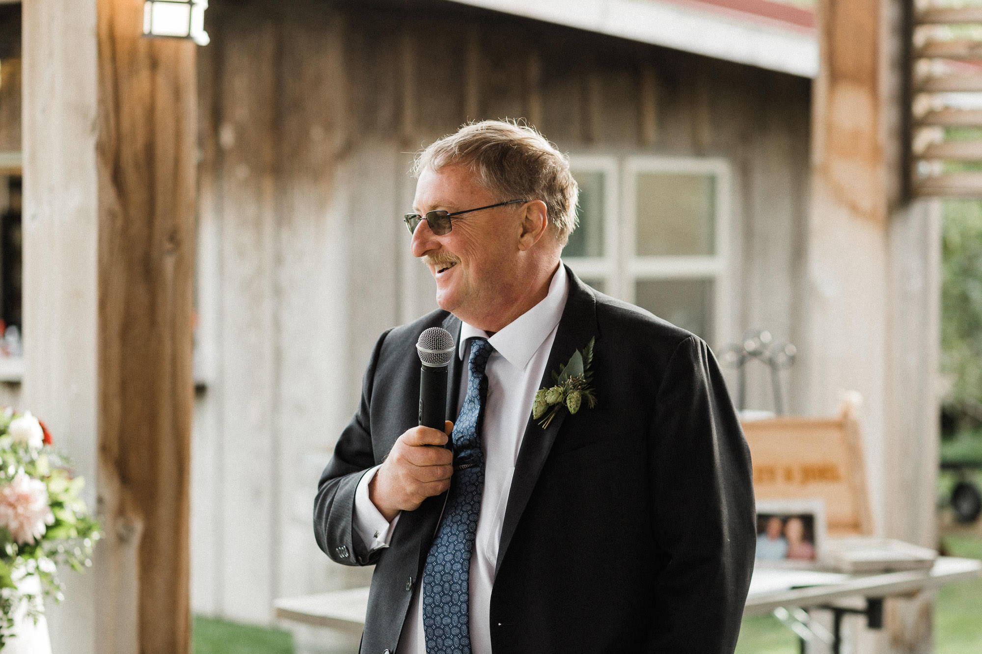 The father of the bride gives a toast at Mt. View Orchards.