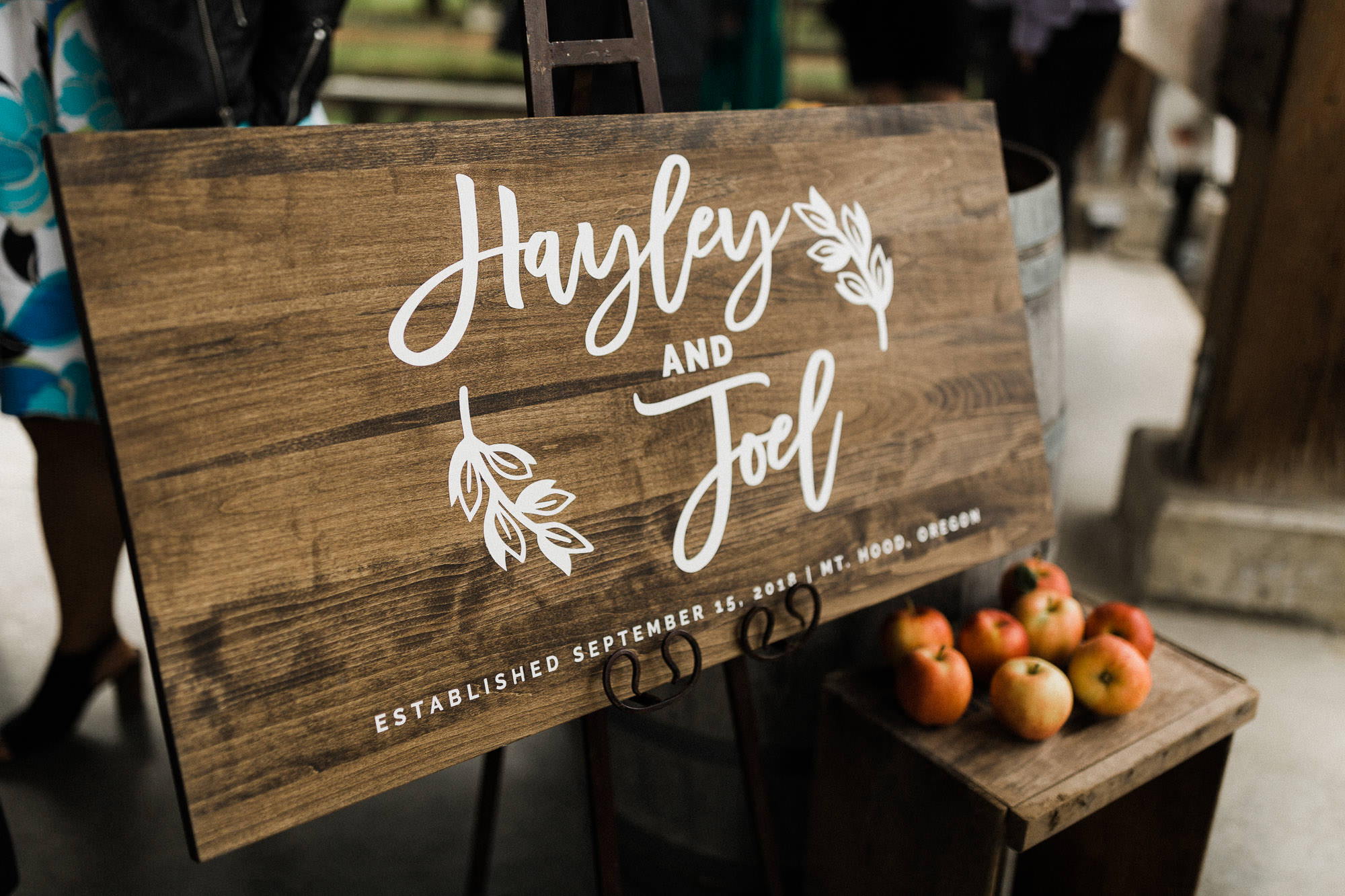 A sign reading "Hayley and Joel, Established September 15, 2018 | Mt Hood, Oregon"