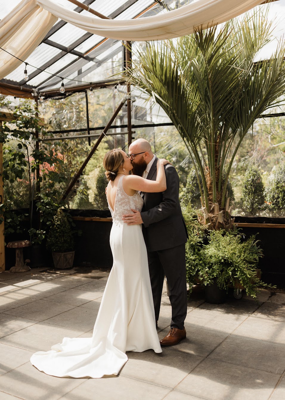 Creative and adorable, this is the most popular wedding first look picture. The bride and groom's initial meeting moment in a garden was captured perfectly.