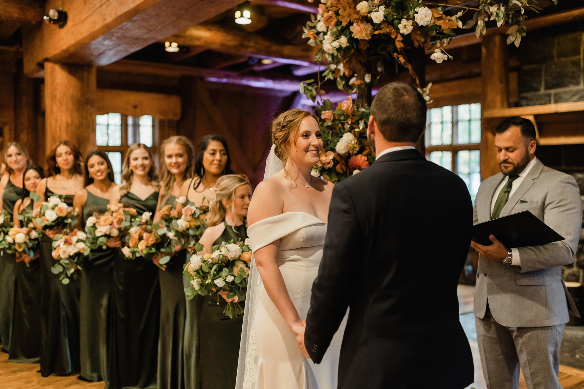 Bride smiles during ceremony at Sunriver Resort's Great Hall