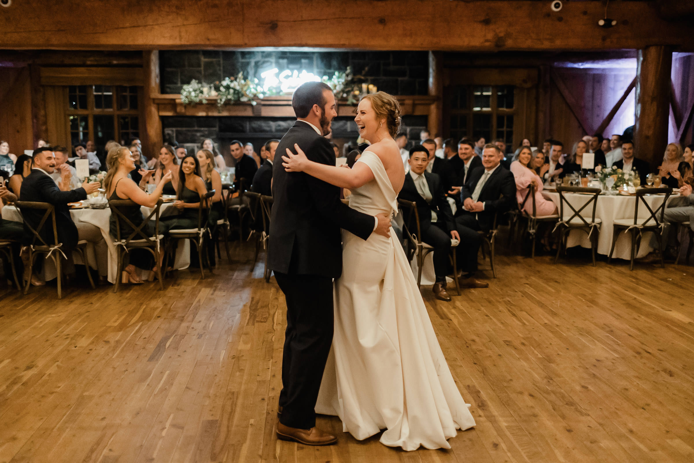 Bride and groom share their first dance at Sunriver Resort's Great Hall