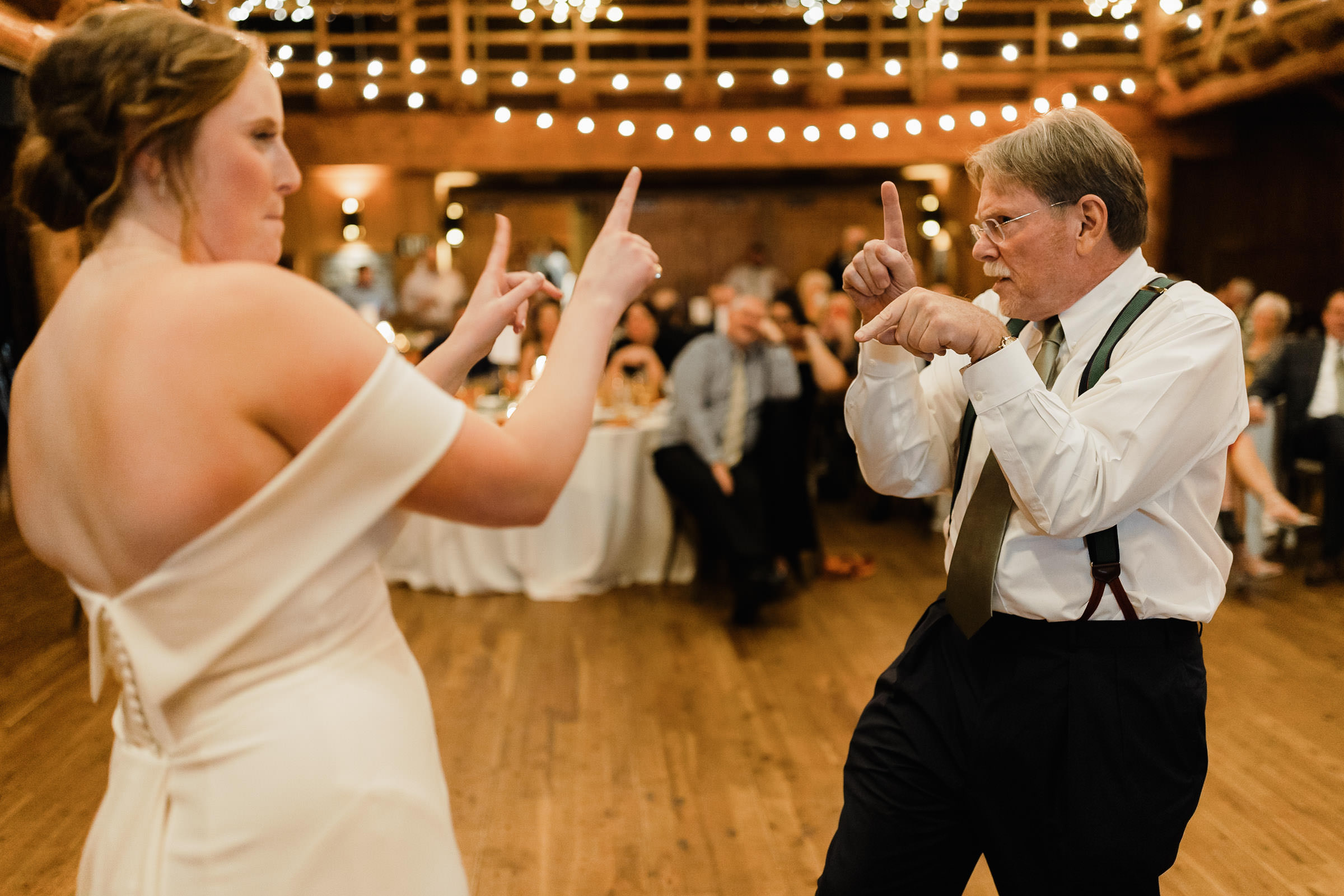 Bride and her dad dance together